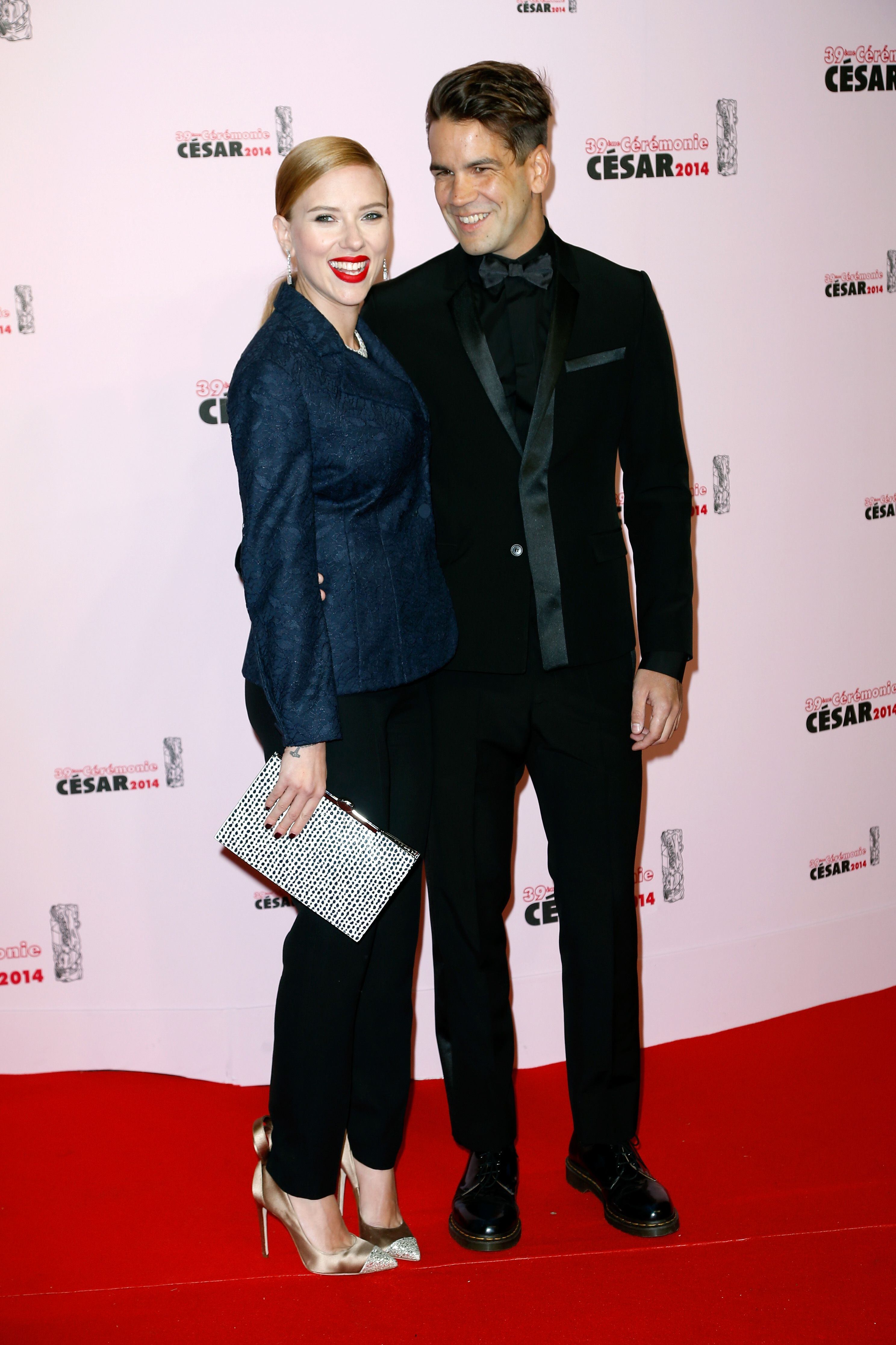 Actress Scarlett Johansson and Romain Dauriac arrive for the 39th Cesar Film Awards 2014 at Theatre du Chatelet on February 28, 2014, in Paris, France.