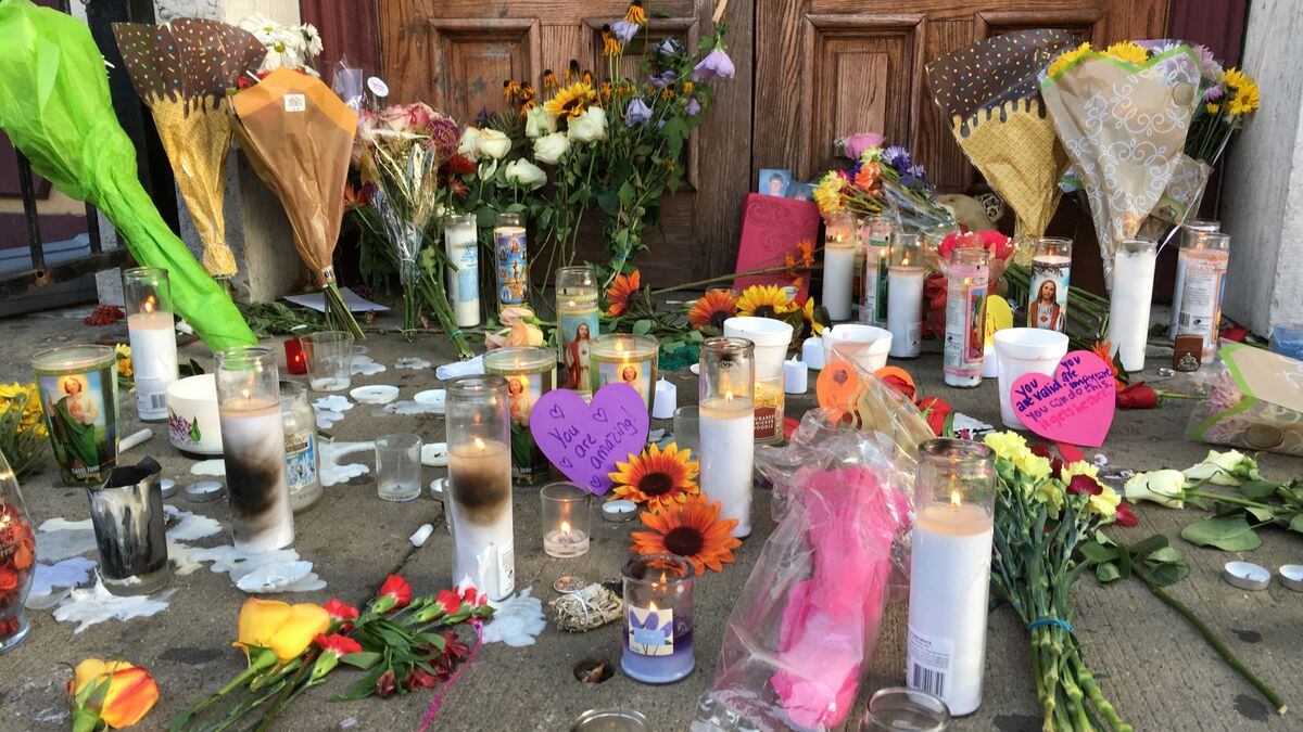 Memorials like this one in front of Ned Peppers bar have popped up in the Oregon District, one day removed from a mass shooting that killed nine victims and one shooter. (Bonnie Meibers/Staff)
