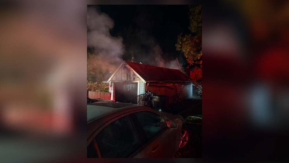 Garage Fire in Miami Township Displaces Occupants; Cats Rescued